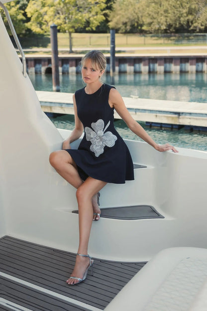 Black Sleeveless Crepe Mini Dress With Rhinestone Flower