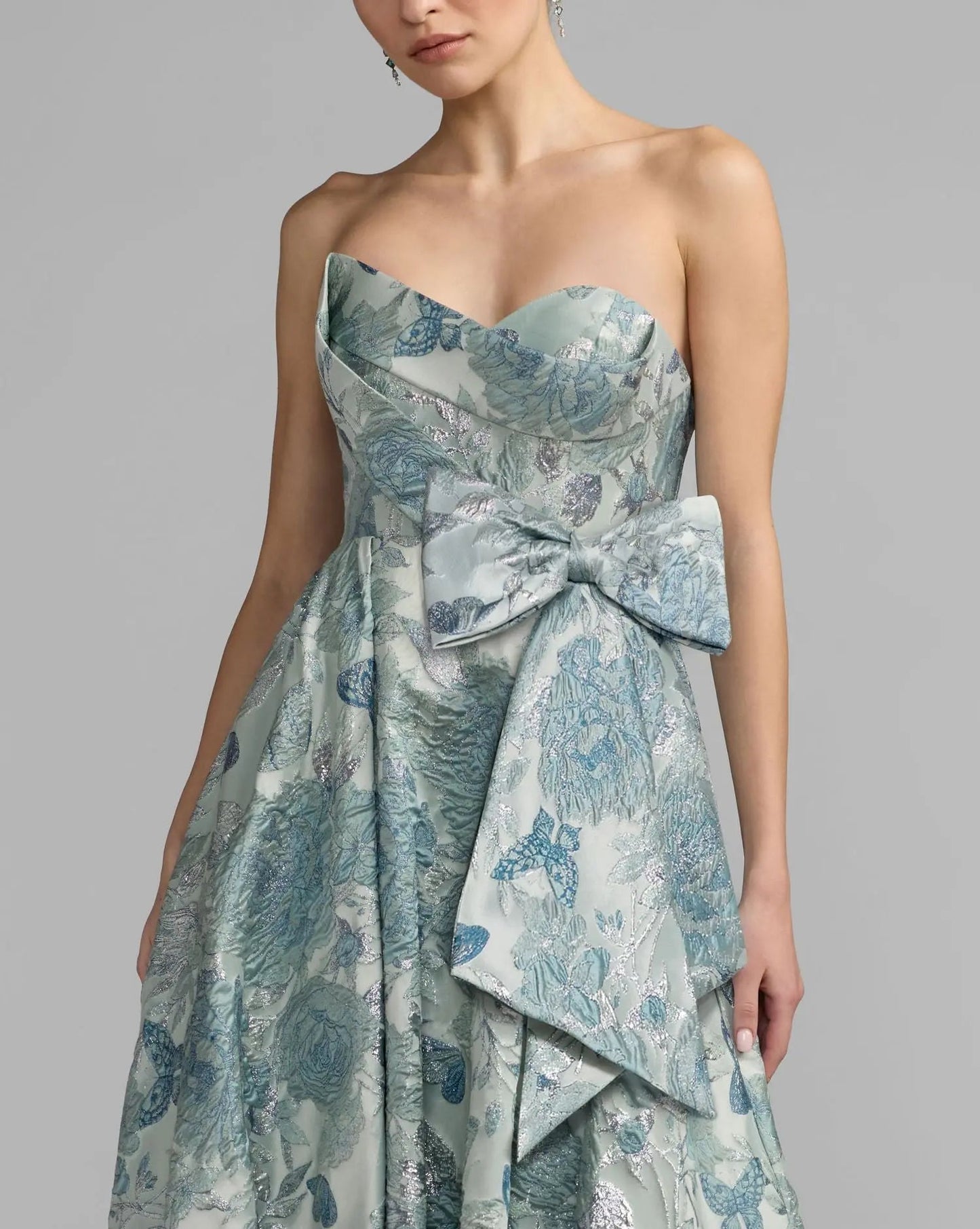Blue Strapless Floral Brocade Ball Gown With Bow Detail